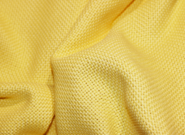 Image shows a woven fabric. Aramid
